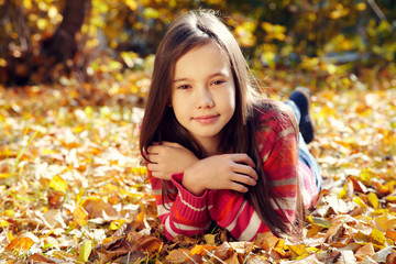 smiling teenage girl in autumn