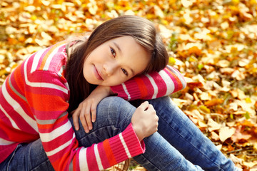 smiling teenage girl in autumn