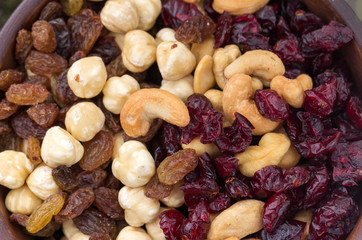 Background of a variety of nuts and berries.