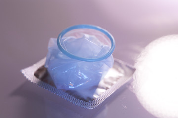Fototapeta na wymiar Rubber condom contraceptive