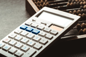 vintage abacus and calculator