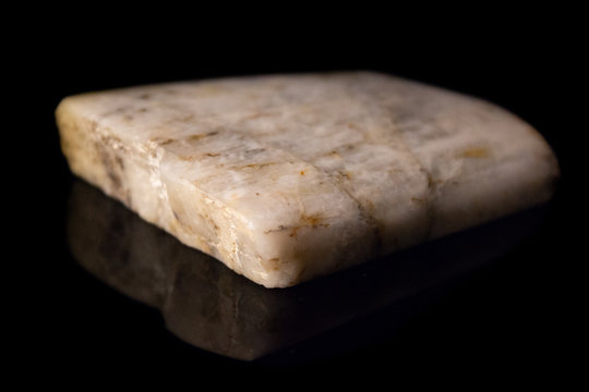 Natural polished belomorite on a black background macro