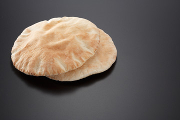 Pita bread black background