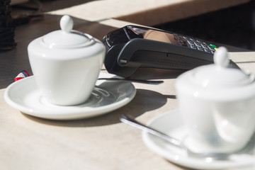 card payment terminal in a cafe
