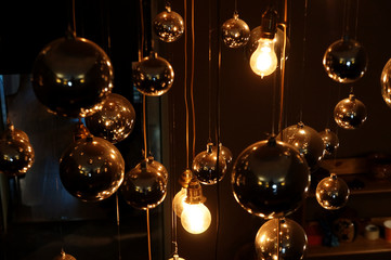Light bulbs on wires in the dark