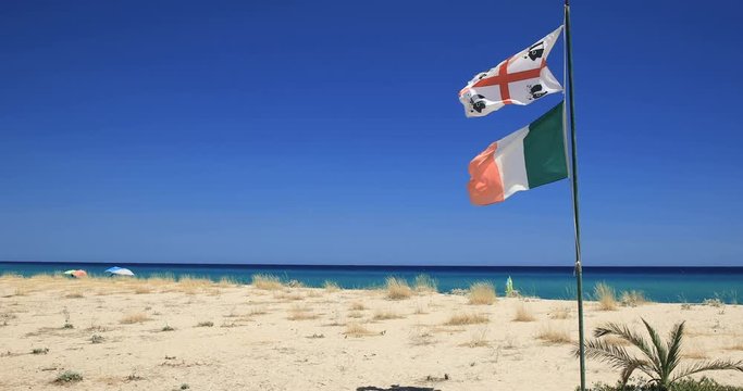 Flag of Sardinia on the beach, Sardinia, Italy, Europe.