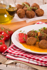 Meatballs with carrot purée.