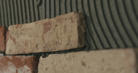 brick cuts tile on the wall closeup