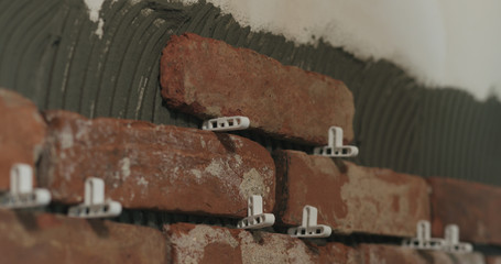 brick cuts tile on the wall closeup