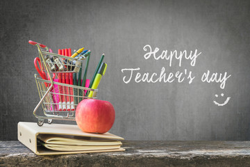 Happy teacher's day concept announcement on school black chalkboard