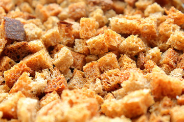 Rusks. Finely chopped dried bread in the oven. Russia. Close-up. Background. Texture.