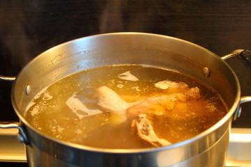 Preparation of soup borsch in a saucepan on a gas stove. Russia.