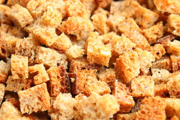 Rusks. Finely chopped dried bread in the oven. Russia. Close-up. Background. Texture.