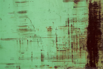 The green steel plate which is corroded.
