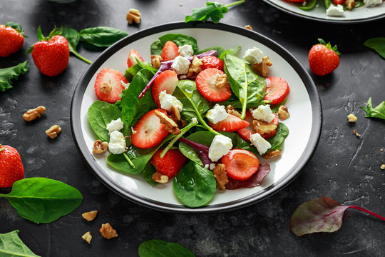 Summer Fruit Strawberry, Spinach Salad With Walnut, Feta Cheese Balsamic Vinegar, Kale. In A Plate. Concepts Health Food