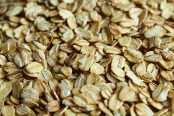 Oat flakes are oatmeal. Close-up. Background.