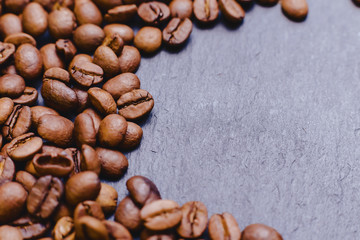 roosted coffee beans texture with dark space for text