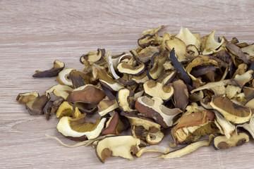 Dried mushrooms on a wooden table.