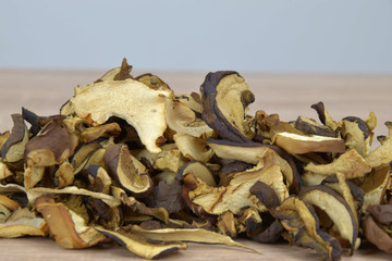 Dried mushrooms on a wooden table.