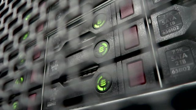 Storage HDD Server. Flashing lamp. Data servers rack with many hard drives and LED lamps blink