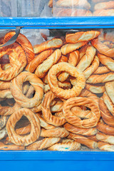 Krakow typical street food Obwarzanki, bread donuts with poppy or sesame seeds, Poland