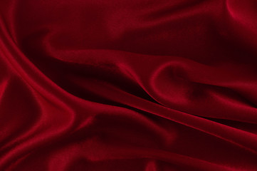 Naklejka na ściany i meble Abstract silk luxury background, piece of cloth, deep red cloth texture