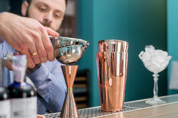 bartender prepares a great cocktail