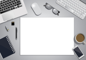 Workplace with tablet computer and mobile phone on table