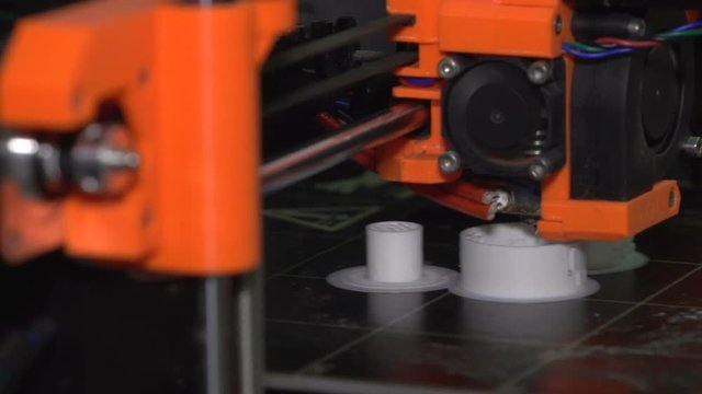 3D printer. High tech technology. 3D printing plastic part, detail.  04