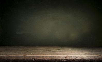 Old wood table top with smoke in the dark background