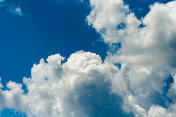 Obraz premium amazing white clouds on blue sky in summer day. Good sunny weather