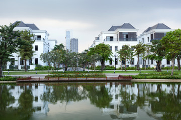 Fototapeta premium Street with brand new suburban affordable white houses