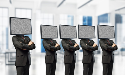 Businessmen with TV instead of head.