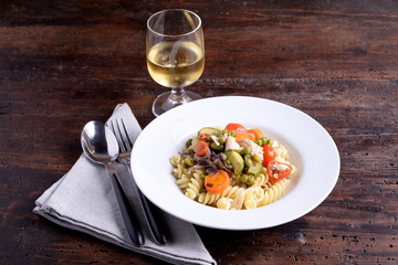 Fusilli pasta dish with organic seasoning 