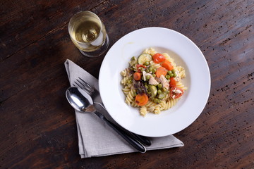 Fusilli pasta dish with organic seasoning 