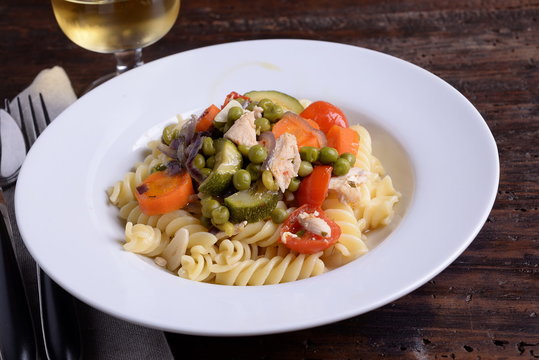 Fusilli pasta dish with organic seasoning 