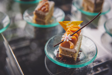 Little chocolate cake decorate with flower sugar
