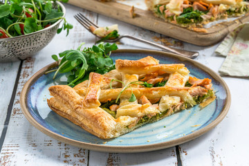 Salmon and broccoli tart with fresh leaf salad