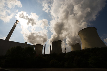 Cooling Towers And Steam Against The Sun