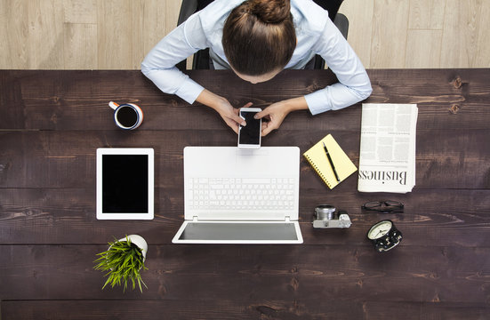 Businesswoman working at her desk