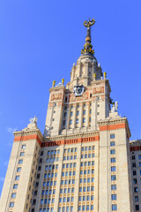 Lomonosov Moscow State University (MSU) tower with star on the spire against blue sky