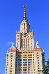Obraz premium Tower of Lomonosov Moscow State University (MSU) in sunny summer evening on a blue sky background