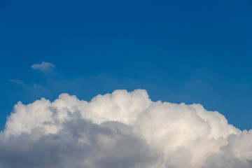 Naklejka na ściany i meble white clouds on the blue sky background