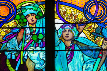 Detail of art nouveau stained glass window by Alfons Mucha, St. Vitus Cathedral, Prague castle, Czech Republic - women who symbolize Czech and Slovakian people
 - obrazy, fototapety, plakaty