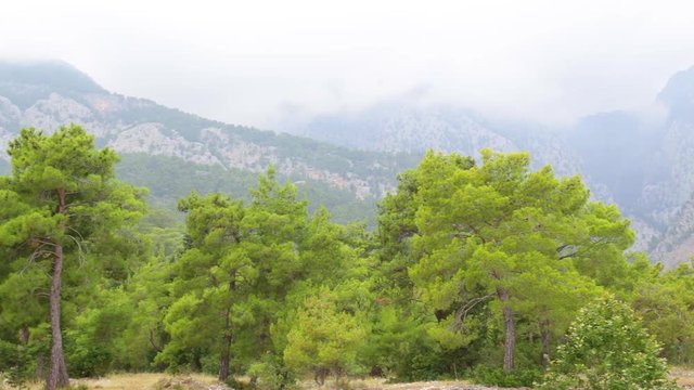 Beautiful cloudy scenic landscape. Taurus mountains in Turkey, Beldibi town area situated between Kemer and Antalya turkish cities. Camera moving from left to right.