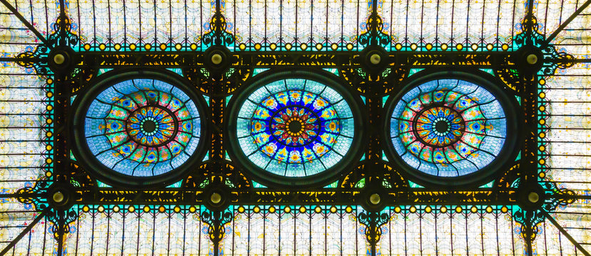Colorful stained glass ceiling in floral art nouveau style
