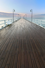 Wooden pier at sea shore, morning view, Gdynia Orlowo poland