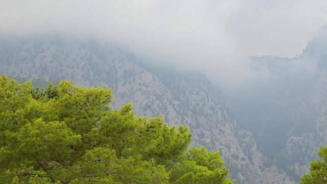 Beautiful cloudy scenic landscape. Taurus mountains in Turkey, Beldibi town area situated between Kemer and Antalya turkish cities. Camera moving from left to right.