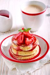 Pancakes with strawberry sauce