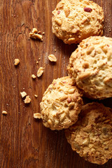 Bunch of chocolate biscuits on a rustic wooden background, close-up, selective focus.
